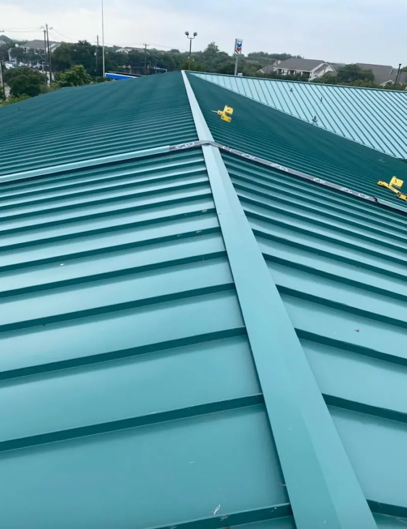 Green commercial metal roof ridge and valley for Metal Roof Repair in West Modesto